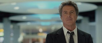 Movie still from “Last Chance Harvey” (2008), directed by Joel Hopkins – A person wearing a suit and tie; Close Up shot, Low angle