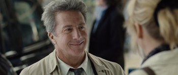 Movie still from “Last Chance Harvey” (2008), directed by Joel Hopkins – A person wearing a suit and tie; Close Up shot, Over the shoulder angle