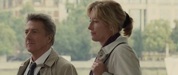 Movie still from “Last Chance Harvey” (2008), directed by Joel Hopkins – A woman in a beige jacket is standing next to a man; Close Up shot, Over the shoulder angle