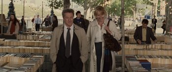 Movie still from “Last Chance Harvey” (2008), directed by Joel Hopkins – A man and a woman walking down a street; Medium shot, Over the shoulder angle