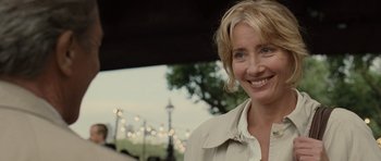 Movie still from “Last Chance Harvey” (2008), directed by Joel Hopkins – A person smiling for a picture; Close Up shot, Over the shoulder angle