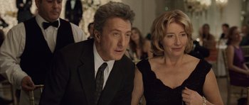 Movie still from “Last Chance Harvey” (2008), directed by Joel Hopkins – A man and a woman sitting next to each other at an event; Close Up shot, Over the shoulder angle