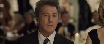 Movie still from “Last Chance Harvey” (2008), directed by Joel Hopkins – A person wearing a suit and tie; Close Up shot, Over the shoulder angle