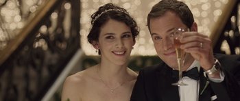 Movie still from “Last Chance Harvey” (2008), directed by Joel Hopkins – A man and a woman posing for a picture; Close Up shot, Over the shoulder angle