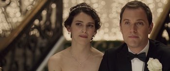 Movie still from “Last Chance Harvey” (2008), directed by Joel Hopkins – A woman in a black dress and a man in a black suit; Close Up shot, Over the shoulder angle
