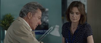 Movie still from “Last Chance Harvey” (2008), directed by Joel Hopkins – An older man and a younger woman are looking at each other; Close Up shot, Over the shoulder angle