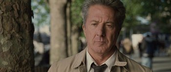 Movie still from “Last Chance Harvey” (2008), directed by Joel Hopkins – An older man in a suit and tie looking to his left; Close Up shot, Over the shoulder angle