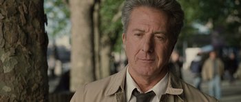 Movie still from “Last Chance Harvey” (2008), directed by Joel Hopkins – An older man wearing a tan jacket and a tie; Close Up shot, Over the shoulder angle