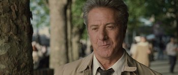 Movie still from “Last Chance Harvey” (2008), directed by Joel Hopkins – A person wearing a suit and tie; Close Up shot, Over the shoulder angle