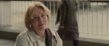 Movie still from “Last Chance Harvey” (2008), directed by Joel Hopkins – A person wearing a jacket and a neck tie; Close Up shot, Over the shoulder angle