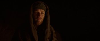 Movie still from “Last Days in the Desert” (2015), directed by Rodrigo García – A man with a beard wearing a head covering; Close Up shot, Low angle