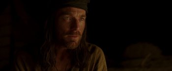 Movie still from “Last Days in the Desert” (2015), directed by Rodrigo García – A person with long hair; Close Up shot, Over the shoulder angle