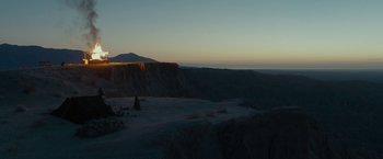 Movie still from “Last Days in the Desert” (2015), directed by Rodrigo García – A person standing on top of a hill at sunset; Extreme Wide shot, High angle