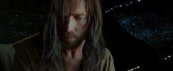 Movie still from “Last Days in the Desert” (2015), directed by Rodrigo García – A person with long hair; Close Up shot, Over the shoulder angle