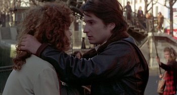 Movie still from “Last Tango in Paris” (1972), directed by Bernardo Bertolucci – A man and a woman standing next to each other; Close Up shot, Over the shoulder angle