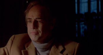 Movie still from “Last Tango in Paris” (1972), directed by Bernardo Bertolucci – A person wearing a jacket; Close Up shot, Low angle