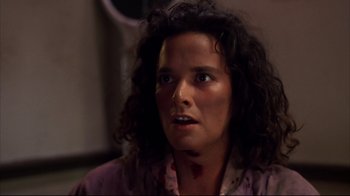 Movie still from “Leatherface: Texas Chainsaw Massacre III” (1990), directed by Jeff Burr – A person with a bruise on their face; Close Up shot, Low angle