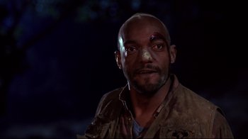 Movie still from “Leatherface: Texas Chainsaw Massacre III” (1990), directed by Jeff Burr – A man with a bandage on his head and face; Close Up shot, Low angle