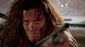 Movie still from “Leatherface: Texas Chainsaw Massacre III” (1990), directed by Jeff Burr – A person with blood on their face; Close Up shot, Low angle