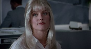 Movie still from “Leaving Las Vegas” (1995), directed by Mike Figgis – A person with long white hair; Close Up shot, Over the shoulder angle