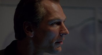 Movie still from “Leaving Las Vegas” (1995), directed by Mike Figgis – A man's face in the dark; Close Up shot, Low angle