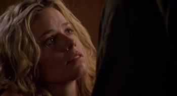 Movie still from “Leaving Las Vegas” (1995), directed by Mike Figgis – A person crying in a room; Close Up shot, Over the shoulder angle