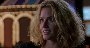 Movie still from “Leaving Las Vegas” (1995), directed by Mike Figgis – A person with curly hair; Close Up shot, Low angle