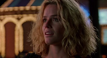 Movie still from “Leaving Las Vegas” (1995), directed by Mike Figgis – A person with curly hair; Close Up shot, Low angle