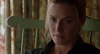 Movie still from “Leaving Las Vegas” (1995), directed by Mike Figgis – A person sitting in front of a window; Close Up shot, Over the shoulder angle