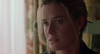 Movie still from “Leaving Las Vegas” (1995), directed by Mike Figgis – A person looking at the camera; Close Up shot, Over the shoulder angle