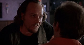 Movie still from “Leaving Las Vegas” (1995), directed by Mike Figgis – A person talking to another person; Close Up shot, Over the shoulder angle