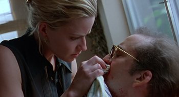 Movie still from “Leaving Las Vegas” (1995), directed by Mike Figgis – A man and a woman brushing their teeth together; Close Up shot, Low angle