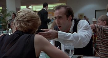 Movie still from “Leaving Las Vegas” (1995), directed by Mike Figgis – A man and a woman are arguing at a restaurant; Close Up shot, Over the shoulder angle