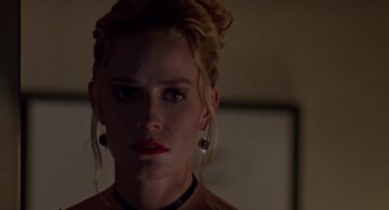 Movie still from “Leaving Las Vegas” (1995), directed by Mike Figgis – A person wearing a necklace; Close Up shot, Low angle