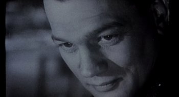 Movie still from “Leaving Las Vegas” (1995), directed by Mike Figgis – A man's face in black - and - white; Close Up shot, Low angle