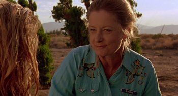 Movie still from “Leaving Las Vegas” (1995), directed by Mike Figgis – A person wearing a blue shirt; Close Up shot, Low angle