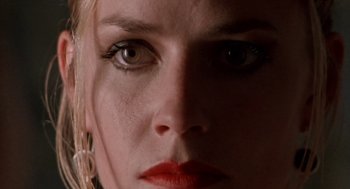 Movie still from “Leaving Las Vegas” (1995), directed by Mike Figgis – A woman's face with red lipstick; Extreme Close Up shot, Low angle