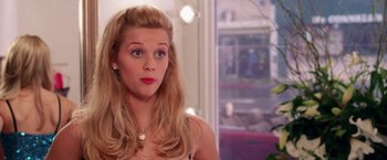 Movie still from “Legally Blonde” (2001), directed by Robert Luketic – A person with long blonde hair; Medium shot, Over the shoulder angle