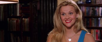Movie still from “Legally Blonde” (2001), directed by Robert Luketic – A person with long blond hair; Close Up shot, High angle