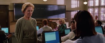 Movie still from “Legally Blonde” (2001), directed by Robert Luketic – A group of people sitting at a table with computers; Medium shot, Over the shoulder angle