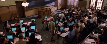 Movie still from “Legally Blonde” (2001), directed by Robert Luketic – A group of people sitting in a room with laptops; Wide shot, High angle