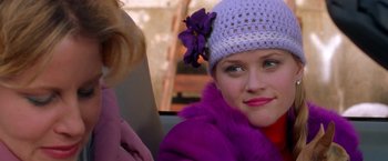 Movie still from “Legally Blonde” (2001), directed by Robert Luketic – A person wearing a hat; Close Up shot, Over the shoulder angle