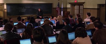 Movie still from “Legally Blonde” (2001), directed by Robert Luketic – A class room full of students sitting in front of an instructor; Wide shot, High angle