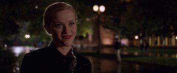 Movie still from “Legally Blonde” (2001), directed by Robert Luketic – A person wearing a shirt and tie; Close Up shot, Over the shoulder angle