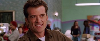 Movie still from “Legally Blonde” (2001), directed by Robert Luketic – A person smiling for the camera; Close Up shot, Over the shoulder angle