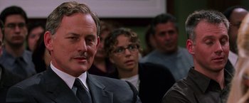 Movie still from “Legally Blonde” (2001), directed by Robert Luketic – A group of people sitting in a room; Close Up shot, Over the shoulder angle