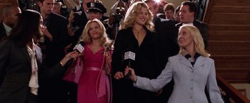 Movie still from “Legally Blonde” (2001), directed by Robert Luketic – Two women in a red dress and one in a black dress and one in a pink dress; Medium shot, Low angle