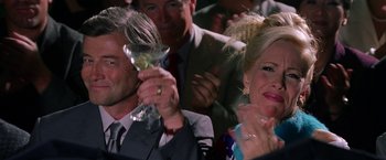 Movie still from “Legally Blonde” (2001), directed by Robert Luketic – A man and a woman sitting next to each other holding wine glasses; Close Up shot, Over the shoulder angle