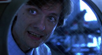 Movie still from “Legally Blonde 2: Red, White & Blonde” (2003), directed by Charles Herman-Wurmfeld – A man's face in the dark; Close Up shot, Low angle