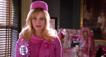 Movie still from “Legally Blonde 2: Red, White & Blonde” (2003), directed by Charles Herman-Wurmfeld – A woman wearing a pink outfit and a pink hat; Medium shot, Over the shoulder angle